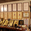 Многочисленные дипломы с конкурсов виноделия