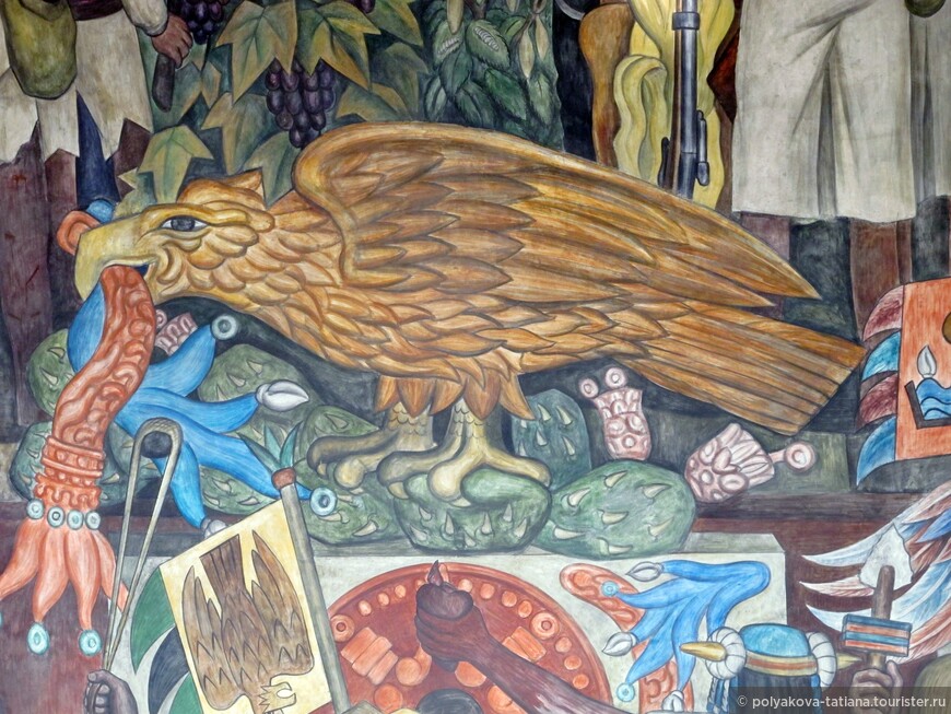 Орел держит в клюве змею и сидит на кактусе- это был знак ацтекам, что здесь надо построить город
