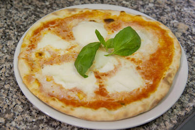 Antico Pozzo
пицца
(фото с оф.сайта)