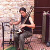Сан Джиминьяно, уличный музыкант Симоне, играет на старинных музыкальных инструментах , экскурсии по Флоренции и Тоскане с частным индивидуальным гидом на русском языке