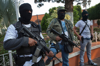 В Мексике вооруженные бандиты ограбили туристов прямо в отеле