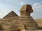 Сфинкс и вид на пирамиду Хеопса