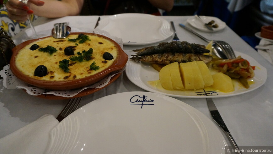 Здесь можно полакомиться настоящей португальской кухней: бакалау кон наташ и сардинки на гриле.