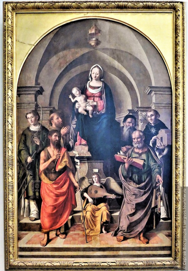 Марко Пальмеццано (1460-1539). Мадонна с младенцем в окружении святых. 1537.