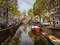 Амстердам еще называют Северной Венецией. Здесь более 160 каналов, их глубина около трех метров
