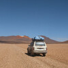 машины на дорогах Боливии в Потоси