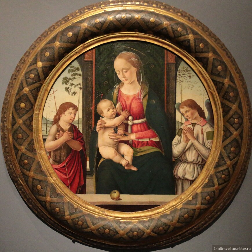  Бьяджо д'Антонио (1445-1516). Мадонна с младенцем, маленьким Иоанном Крестителем и ангелом. Ок.1490-95. Флорентийский художник, писавший подобные картины на заказ в больших количествах. Круговой формат полотна (тондо) - типично флорентийская черта.