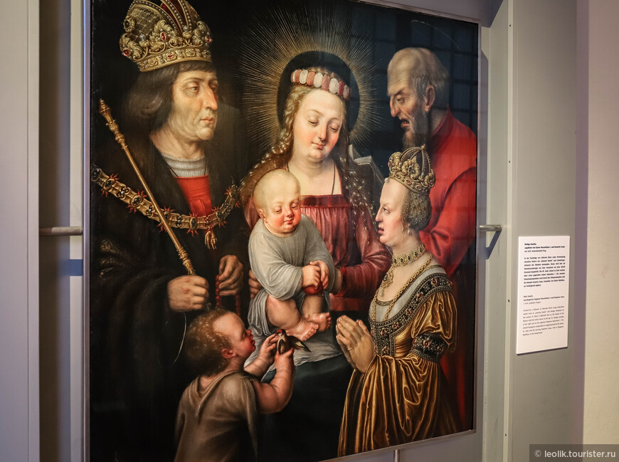 Неизвестный художник в подражании Дюреру. На картине изображено Святое семейство, а рядом император Максимилиан I и императрица Анна, которая ему не жена, а чья жена не помню..