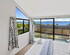 The Bird House - Kawaha Point, Rotorua. Stylish six bedroom home with space, views and relaxed atmosphere