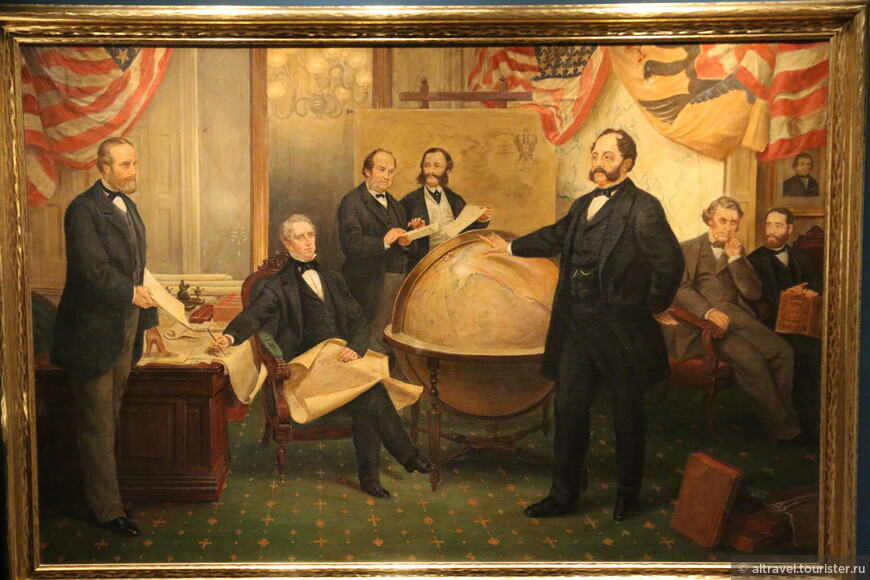 Подписание договора о продаже Аляски 30 марта 1867 года. Основные персонажи: сидит слева - Уильям Сьюард, государственный секретарь США, стоит у глобуса - Эдуард Стекль, российский посланник в Вашингтоне (музей в Джуно).