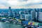 Вид на город и кусочек плавучего стадиона из бассейна на крыше отеля Marina Bay Sands.